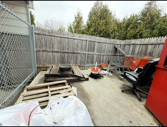 Outdoor junk-removal project before service